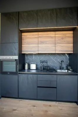 a kitchen with a sink and a stove and cabinets at Mi Filoxenia 2 in Aglantzia