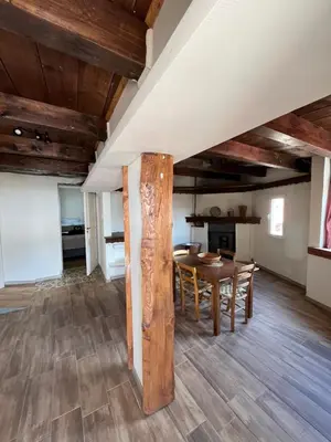 a dining room with a table and chairs at Odou Residence in Odhou