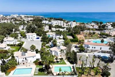 an aerial view of a neighborhood with houses and the ocean at Villa GreenWay - Large Private Pool in Protaras