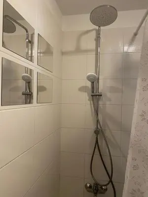 a bathroom with a shower with a shower head at Gorgeous 1 Bedroom apartment close to Town Centre in Limassol