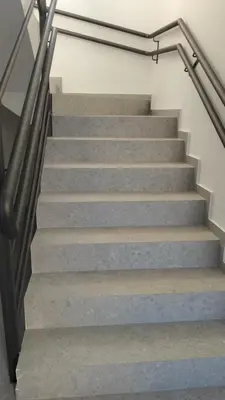 a set of stairs with metal handrail and concrete at Verasia Acute Stay in Engomi in Engomi