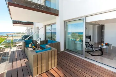 a balcony with a view of the ocean at Apartment Marina - Beachfront in Protaras