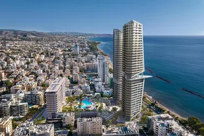 an aerial view of a city and the ocean at Trilogy Limassol Seafront in Limassol