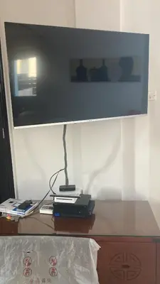 a desk with a television on top of it at MANDARIN Villa in Paralimni