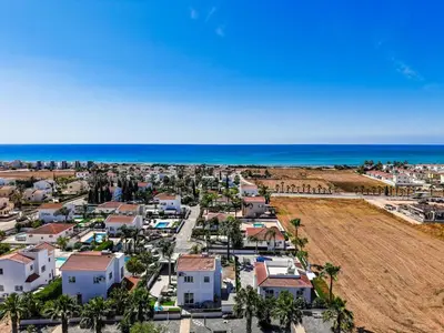 an aerial view of a resort with the ocean at Casa Giovanni By Ezoria Villas in Ayia Napa