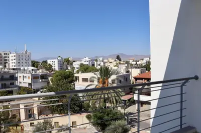 a view from a balcony of a city at Cozy Central Stay with City Views in Nicosia