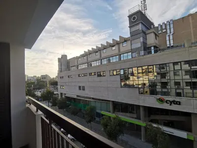 a view of a building from a balcony at Naxou Modern Residence By Staycom in Nicosia