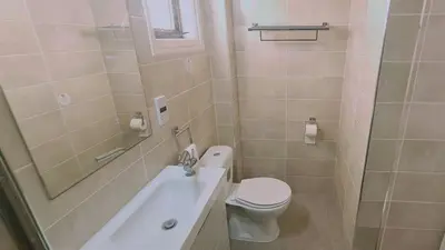 a bathroom with a toilet and a sink at STAY Nissi Heaven Studio in Ayia Napa