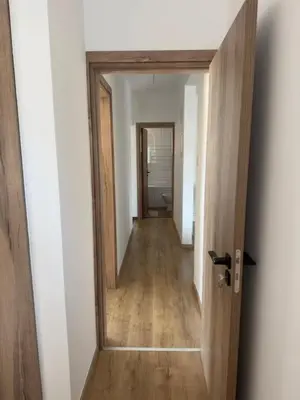 a hallway with a door leading into a room at Stylish 2 bedroom apartment in Limassol in Limassol
