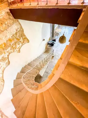 a spiral staircase in a building with wooden floors at 22 Yedia North Nicosia Turkish Side in Nicosia
