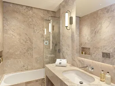 a bathroom with a sink and a shower at Pendeli Resort in Platres