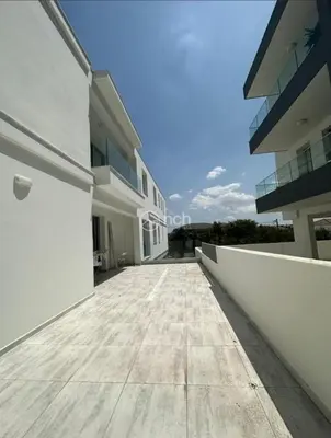 a view from the outside of a white building at 1 bedroom apartment in egkomi makedontissa near unic in Strovolos
