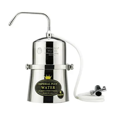 a bottle of water with a metal pipe water fountain at Boutique & Brand New Prime Location Park & Beach in Limassol