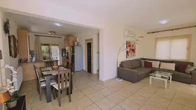a living room with a couch and a table at STAY Nissi House in Ayia Napa