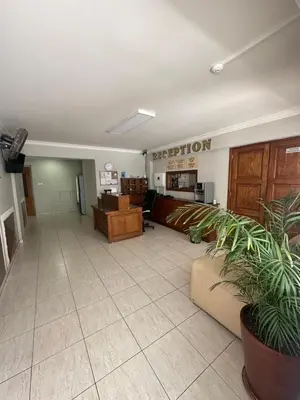 a lobby of a hospital with a waiting room at Ellis Hotel Apartments in Larnaka