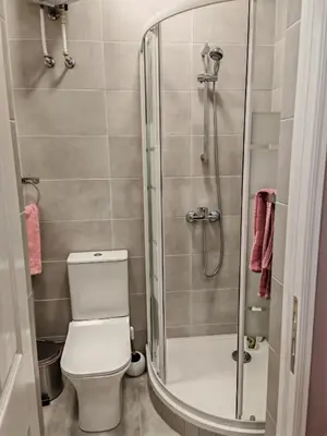 a bathroom with a toilet and a shower at Studio in the center of Nicosia 3 in Nicosia