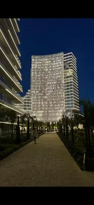 a large building with a lot of lights on it at Grand Sapphire Resort in Aglantzia
