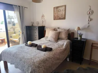 two teddy bears on a bed in a bedroom at 2 Bed Apartment Pool and Sea Views in Oroklini in Voroklini