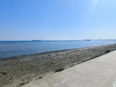 a beach with the ocean in the background at 3 Bedroom Affordable Apartment in Oroklini with Communal Pool in Voroklini