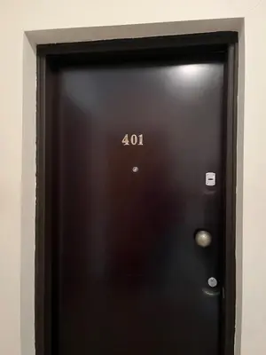 a black door with the number on it at The Comfort Stay in Nicosia Verenikis - Platform 357 in Nicosia
