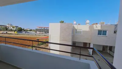 a balcony with a view of a building at STAY Azure Dream Apartment in Paralimni