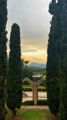 a view of a park with trees and a monument at Family large apartment in Bahçeli in Aglantzia