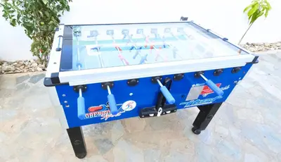 a ping pong ball in a pool table at Villa Elia Blue , hot tube , heated pool in Paralimni
