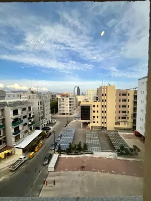 a view of a parking lot in a city with buildings at Sunny Stay 2 Bdr near the sea Platform 357 in Limassol