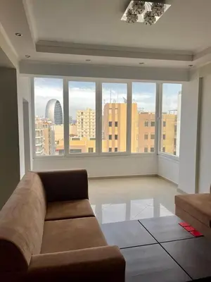 a living room with a couch and large windows at Sunny Stay 2 Bdr near the sea Platform 357 in Limassol