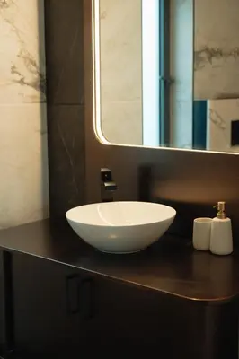 a white sink on a counter in a bathroom at Infinity Residences in Zygi
