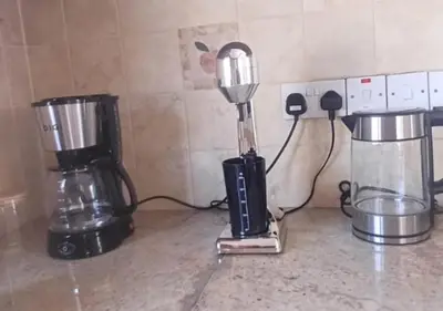 a blender and a coffee maker on a counter at Eros Villa-Private Luxury Estate in Pissouri