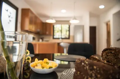 a bowl of fruit on a table in a living room at Villa Lela in Paralimni