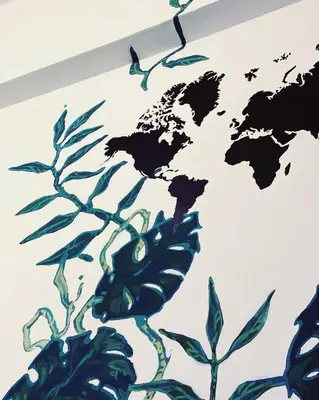 a drawing of a world map on a wall at Lima Sol House in Limassol