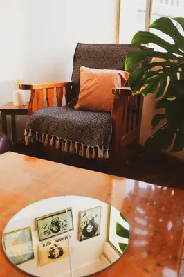 a living room with a chair and a table at Lima Sol House in Limassol