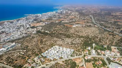 an aerial view of a city and the ocean at Elite Blu Heights Villa in Ayia Napa