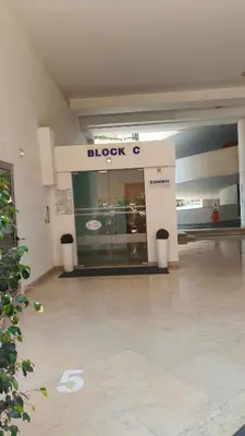 a store front with a blocko sign in a building at Marina City Centre Stays in Larnaka