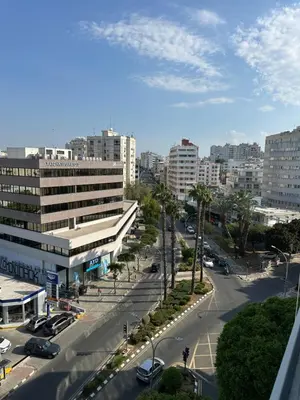 a view of a city with a street and buildings at Kallisti 2bd Central Stay - Wow View in Nicosia