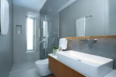 a bathroom with a sink and a toilet and a shower at MAREN - 250m from Golden Sandy Beach in Paralimni