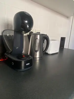 a coffee maker sitting on top of a counter at Sweet Home Apartment 3-Bedrooms in Larnaka