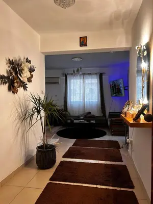 a living room with a rug on the floor at Makenzy 2 Bedrooms Apartment for rent in Larnaka