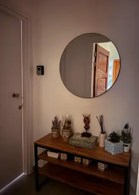 a room with a table with a mirror on the wall at Cozy & Stylish 1Bedroom Apartment in Limassol