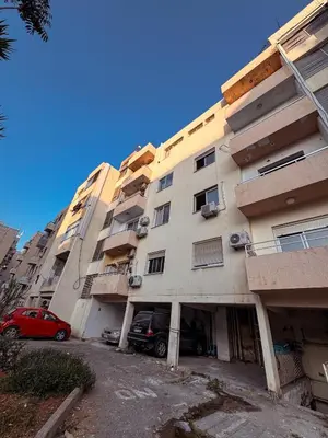 a building with a car parked in front of it at Cozy & Stylish 1Bedroom Apartment in Limassol
