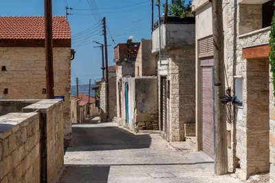an alley in an old town at Traditional Stone House in Vouni, Quiet Stay with Courtyard & BBQ in Vouni