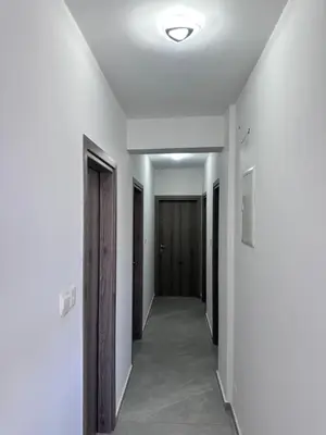 a hallway with white walls and a ceiling at Near Finikoudes beach 1 in Larnaka