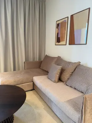 a living room with a couch and a table at Kroisou Comfort Stay 2 BEDROOM in Ayios Dhometios