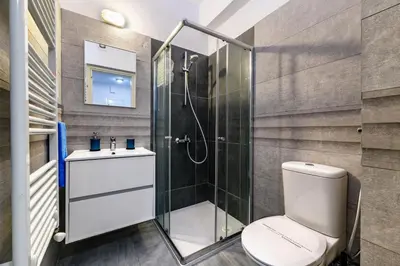 a bathroom with a shower and a toilet at Kymma Seaview #24 in Ayia Napa