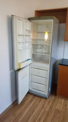 an empty refrigerator with its door open in a kitchen at Poseidon 502 penthouse in Larnaka