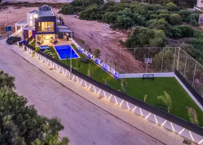 an aerial view of a house with a basketball court at Luxury Elegant Home in Protaras