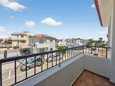 a balcony with a view of a street at Villa Rena - 3BR Retreat near Kalamies Beach in Paralimni