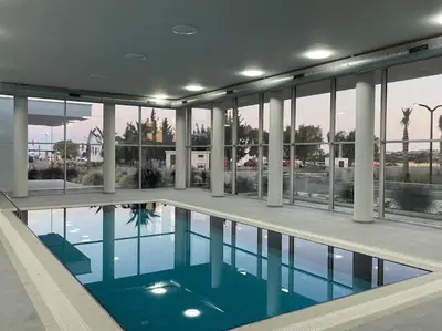 a swimming pool with a view of a building at Northern Cyprus Iskele Bogaz Abelia One plus One Sea View in Boğaz